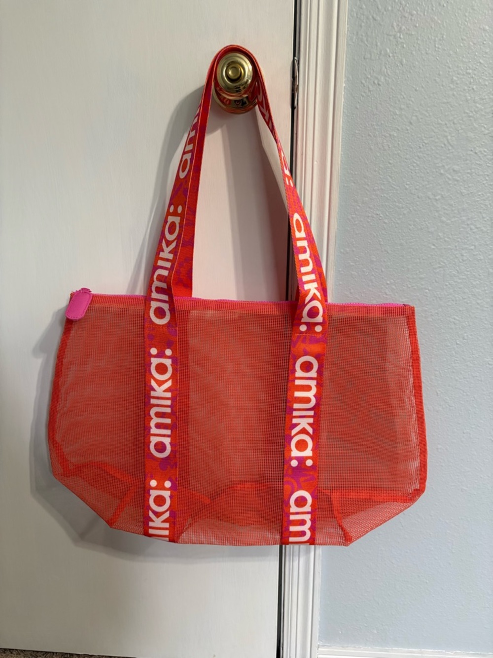 amika Bright Orange Mesh Tote with Pink Trim and Logo Straps